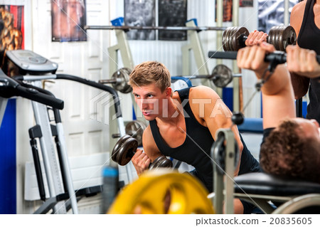 Group of men working his body at gym.  20835605