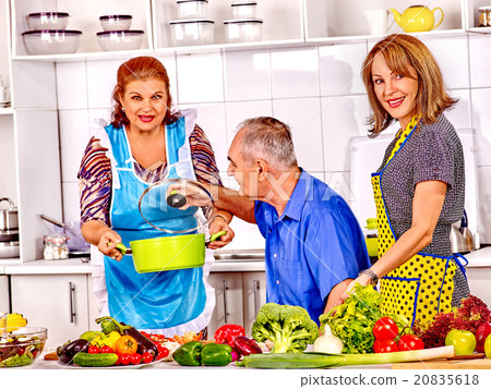 Family cooking at kitchen. Family cooking at kitchen. 20835618