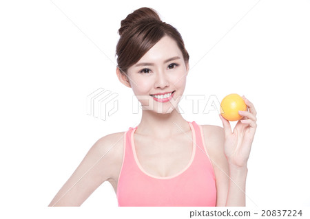 Woman show orange benefit health 20837224
