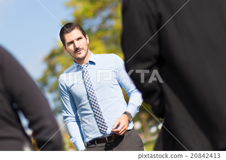 Businessman being blackmailed by two racketeers. 20842413