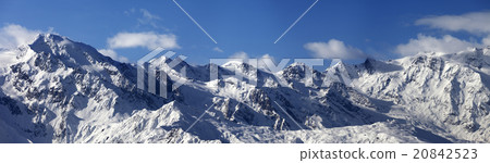 Panoramic view on snowy mountains in sunny day Panoramic view on snowy mountains in sunny day 20842523