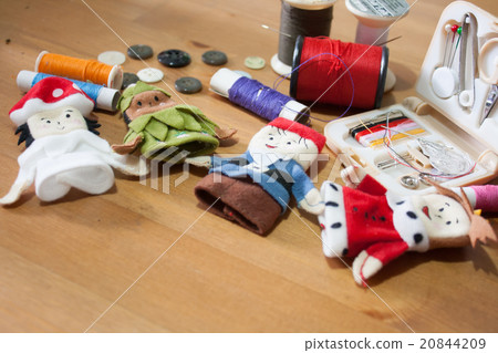 Handmade Christmas doll finger on wood background 20844209