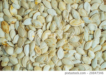 Pumpkin white seeds background Pumpkin white seeds background 20847346