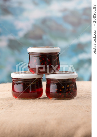 Three jam jars with cones Three jam jars with cones 20850188