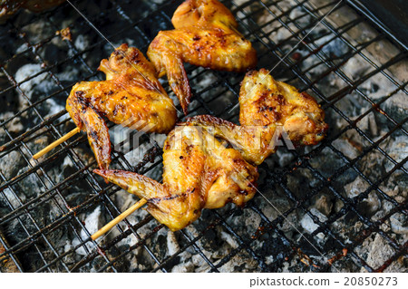 Grilled chicken on the stove. 20850273
