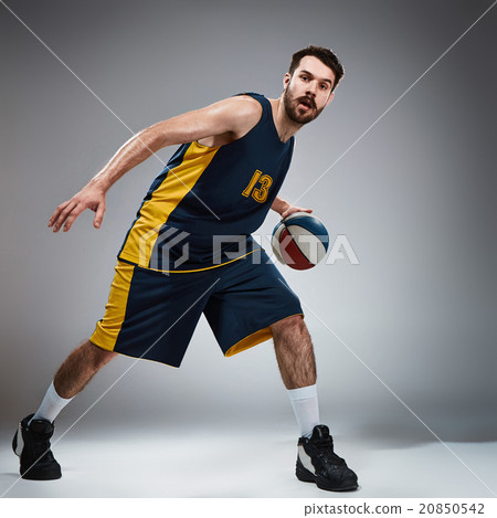 Full length portrait of a basketball player with Full length portrait of a basketball player with 20850542