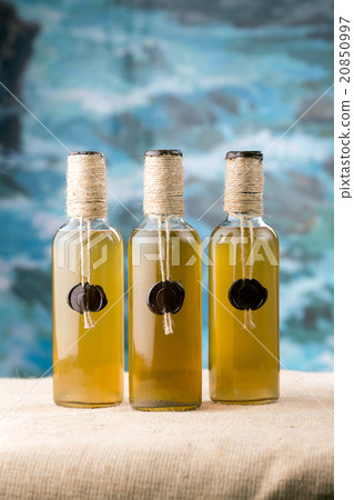 Three bottles of oil sealed with wax 20850997