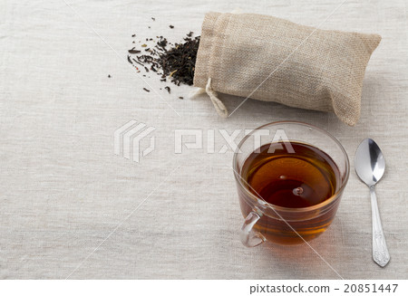 Glass cup and teapot freshly brewed black tea 20851447