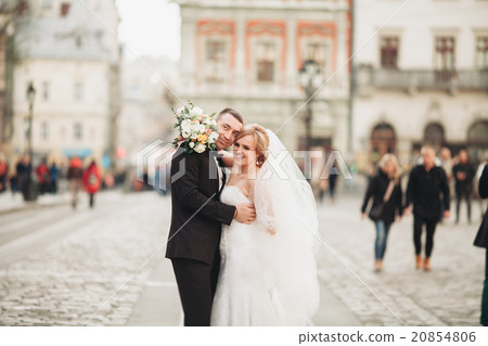 wedding couple is standing and kissing in the wedding couple is standing and kissing in the 20854806