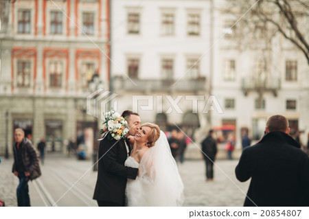 wedding couple is standing and kissing in the wedding couple is standing and kissing in the 20854807