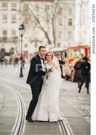 wedding couple is standing and kissing in the wedding couple is standing and kissing in the 20854810