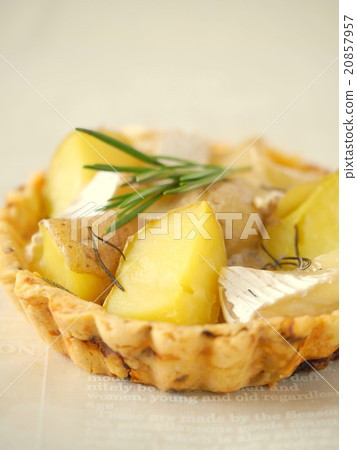 Quiche of potatoes and camembert cheese (vertical position) Quiche of potatoes and camembert cheese (vertical position) 20857957