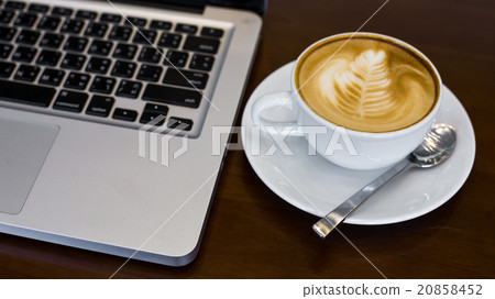 hot latte and laptop 20858452