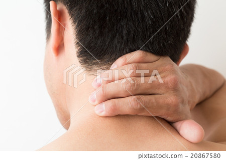 Young men rubbing their neck 20867580