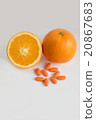orange and vitamin on white background 20867683
