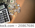 top view calculator money on brown background 20867686