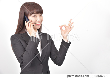 A woman with an understanding sign 20868222