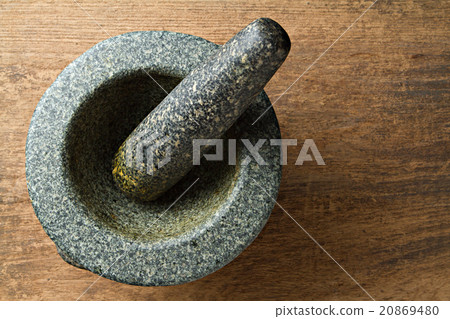 Granite mortar on wooden background. Granite mortar on wooden background. 20869480