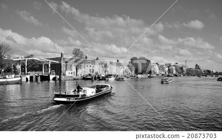 Houses and Boats on Amsterdam Canal Houses and Boats on Amsterdam Canal 20873703
