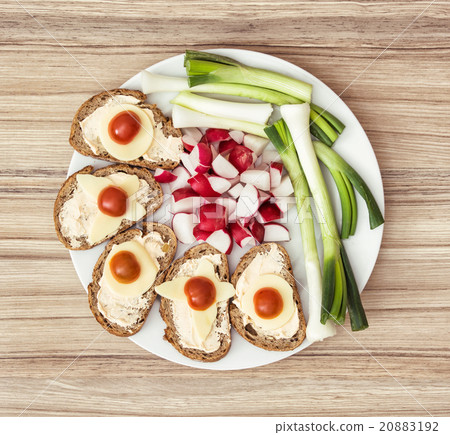 Sliced whole wheat bread with butter, cheese 20883192
