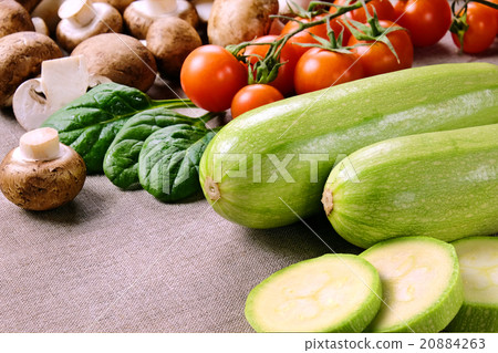 Courgettes with mushrooms and tomatoes. 20884263