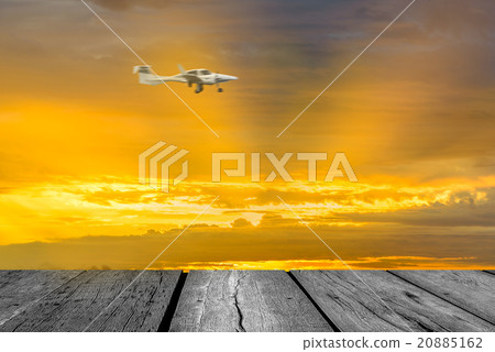Propeller plane with sun set Propeller plane with sun set 20885162
