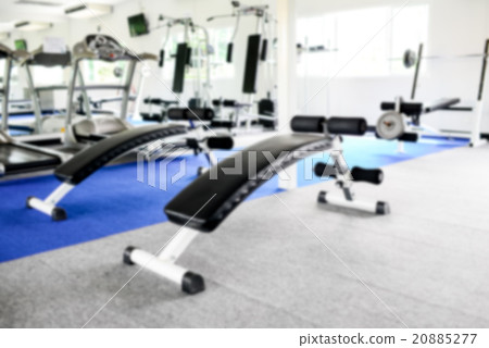 Abstract blur Fitness center with trainee 20885277