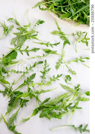 fresh arugula leaves on the wooden table 20886796