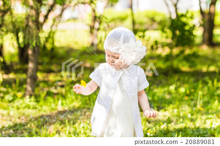 Cute smiling baby girl outdoors Cute smiling baby girl outdoors 20889081