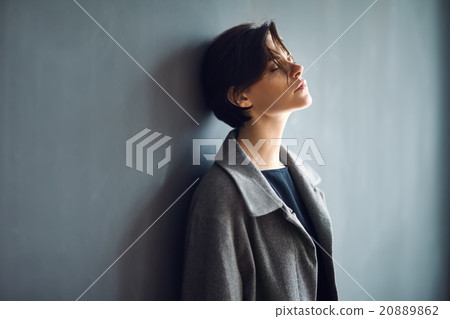 Portrait of tired beautiful woman on dark background Portrait of tired beautiful woman on dark background 20889862