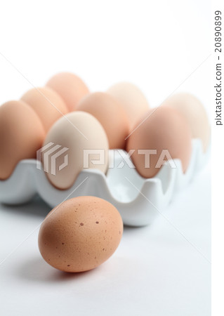 Ceramic egg holder with brown chicken eggs Ceramic egg holder with brown chicken eggs 20890899