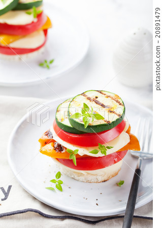 Grilled vegetables and cheese gratin Grilled vegetables and cheese gratin 20891479