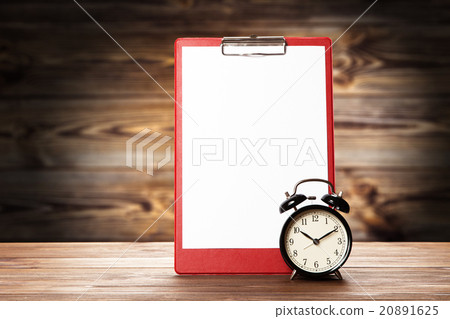 Blank paper sheet and alarm clock Blank paper sheet and alarm clock 20891625