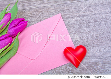 Pink envelope with red heart and purple tulips 20893829