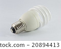 Energy saving fluorescent light bulb on white 20894413