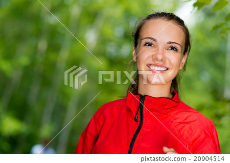 healthy young female athlete running 20904514