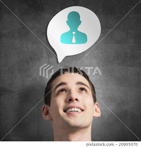 Guy and thinking balloon on concrete wall 20905070