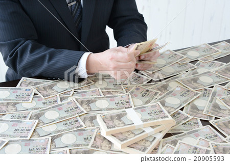A businessman with a big money A businessman with a big money 20905593