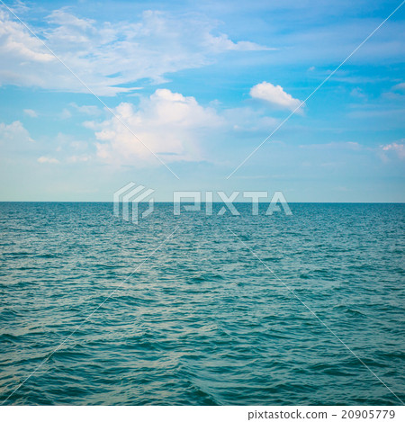 Green sea with waves and clear blue sky Green sea with waves and clear blue sky 20905779