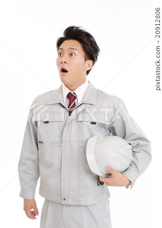 Surprising workers looking at the construction site 20912806