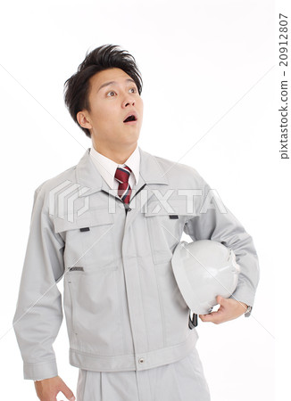 Surprising workers looking at the construction site 20912807