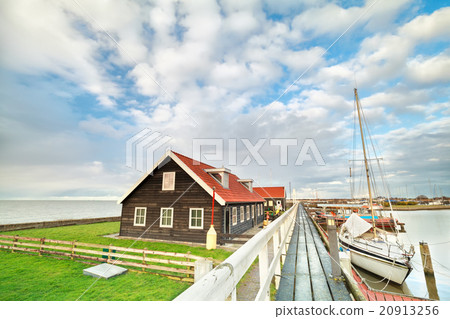 yacht on harbor and blue sky in Hindeloopen yacht on harbor and blue sky in Hindeloopen 20913256