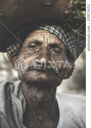 Indigenous Senior Indian Man Looking Grumpy At The Camera Concep Indigenous Senior Indian Man Looking Grumpy At The Camera Concep 20923451