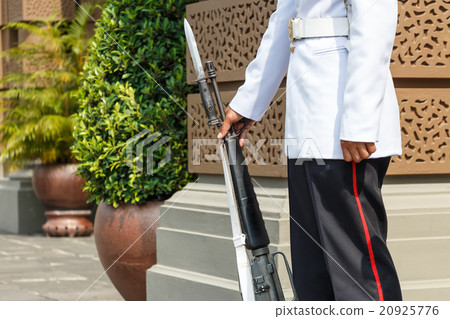 lifeguard hold rifle in front of royal palace lifeguard hold rifle in front of royal palace 20925776