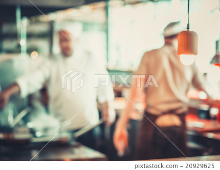 workers cooking in restaurant 20929625