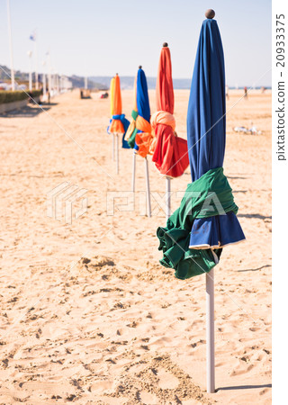 The famous colorful parasols on Deauville beach 20933375