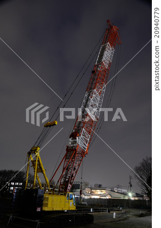 Crawler crane car rising quietly at midnight 20940779