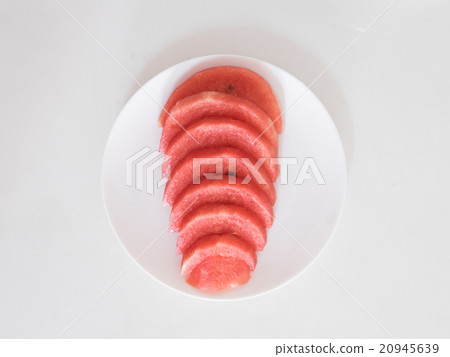 Sliced watermelon on a white plate 20945639