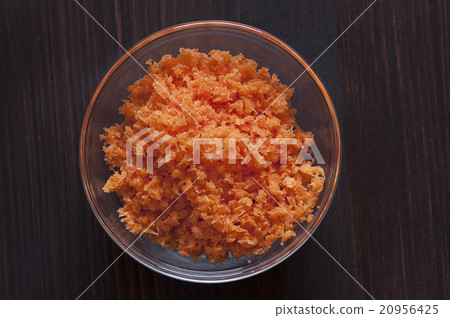 Minced carrots in a glass bowl Minced carrots in a glass bowl 20956425