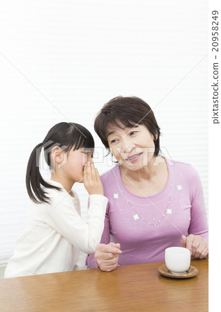 Grandmother talking about secrets and grandchild grandson grandmother and grandchild grandmother and grandchild Grandmother talking about secrets and grandchild grandson grandmother and grandchild grandmother and grandchild 20958249